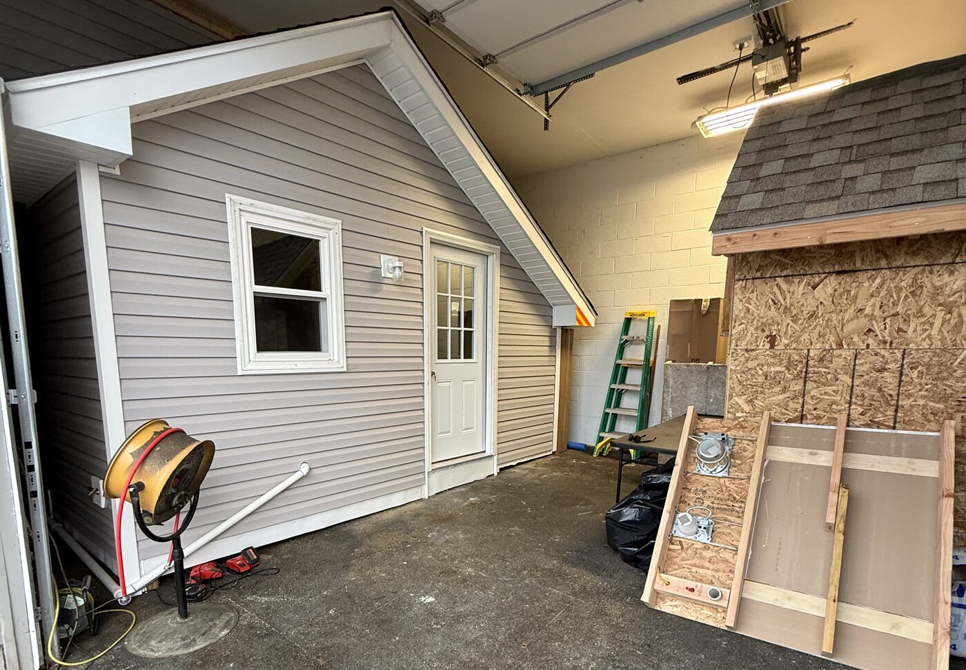 Training bay with a built mock house and wall sections
